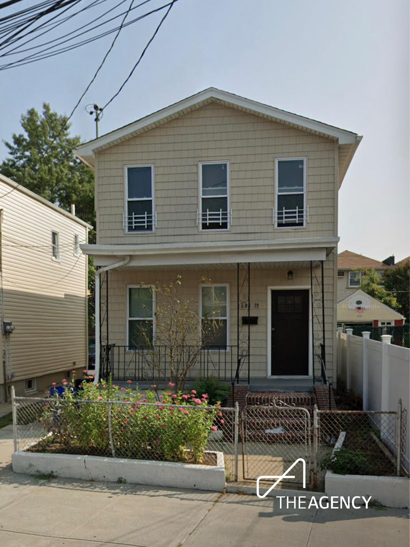 Exterior of a two-story detached house at 101-19 95th Street