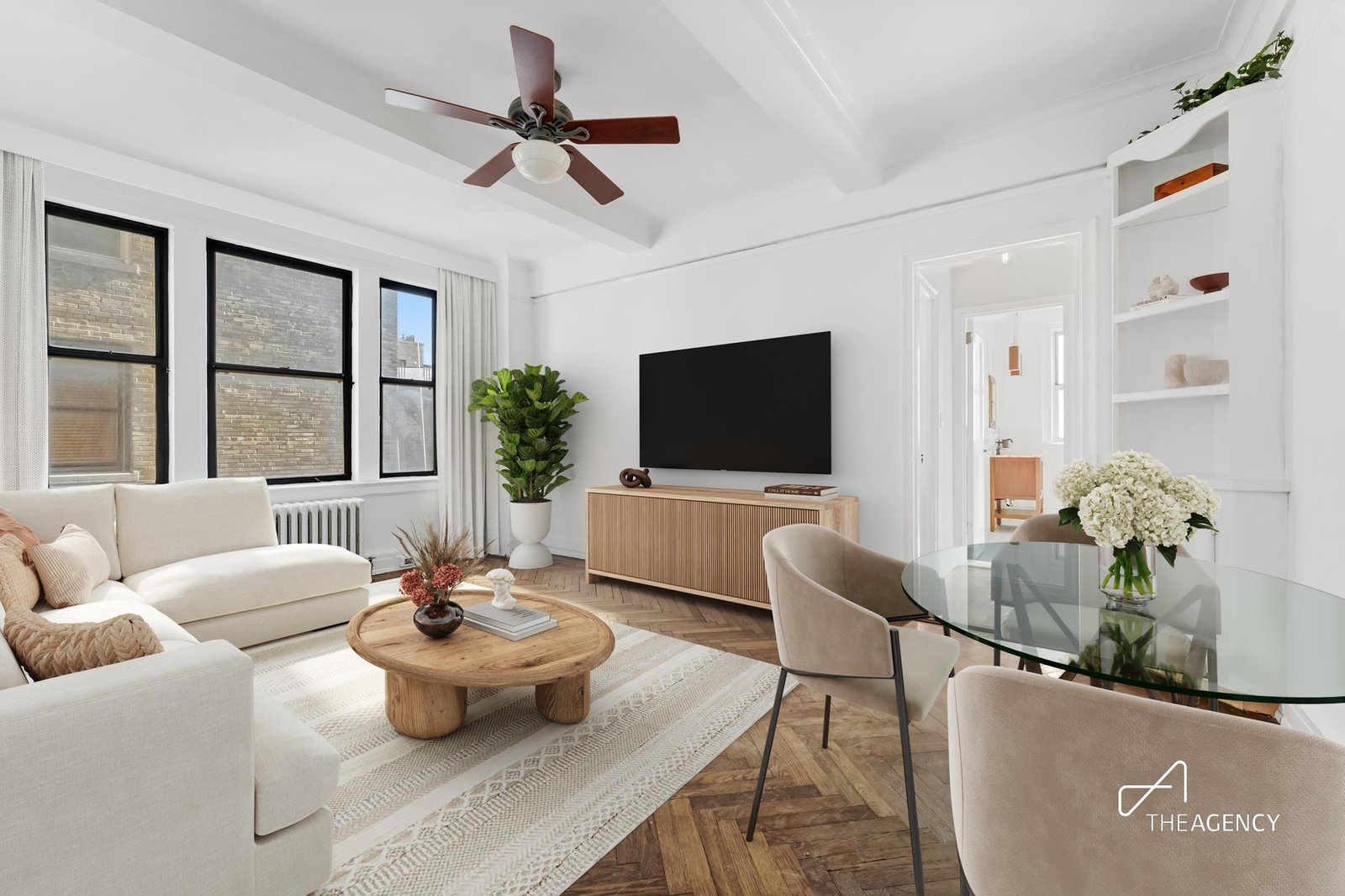 Living room with a ceiling fan at 175 W 73rd Street 8-G