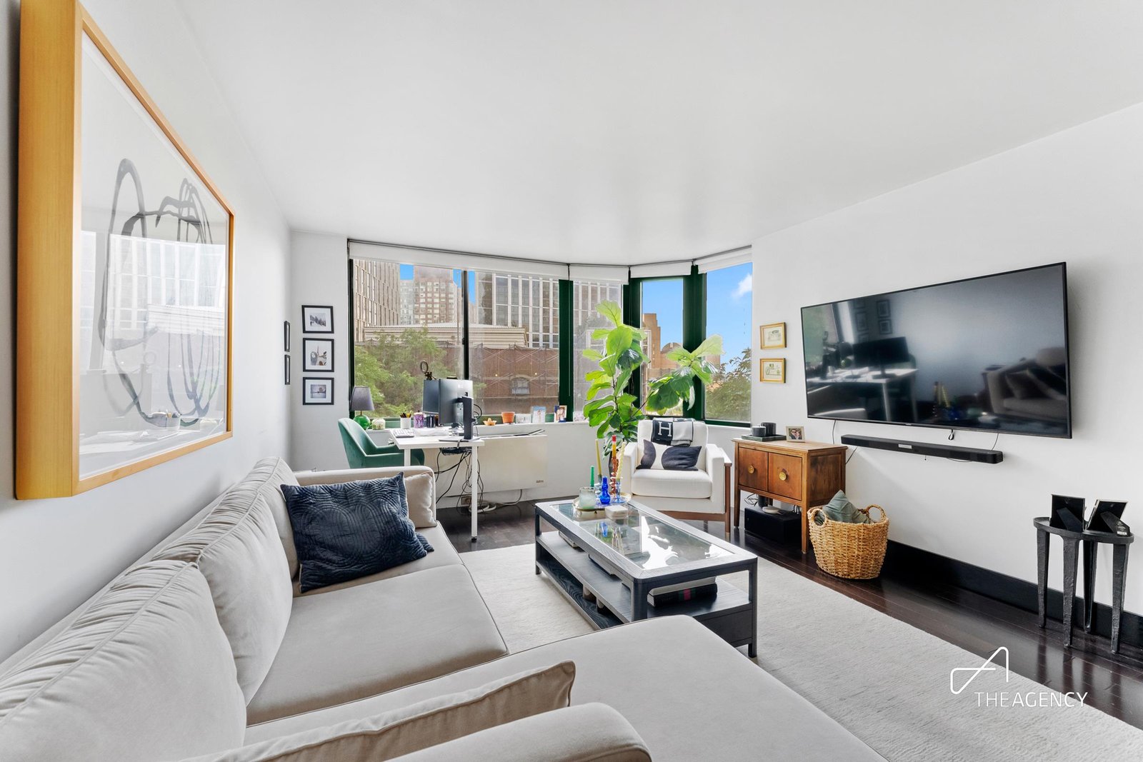 Living room with corner windows at 295 Greenwich Street 4-D