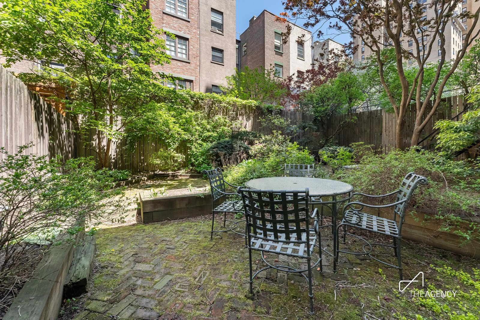 Garden with a table and chairs at 335 W 70th Street 1