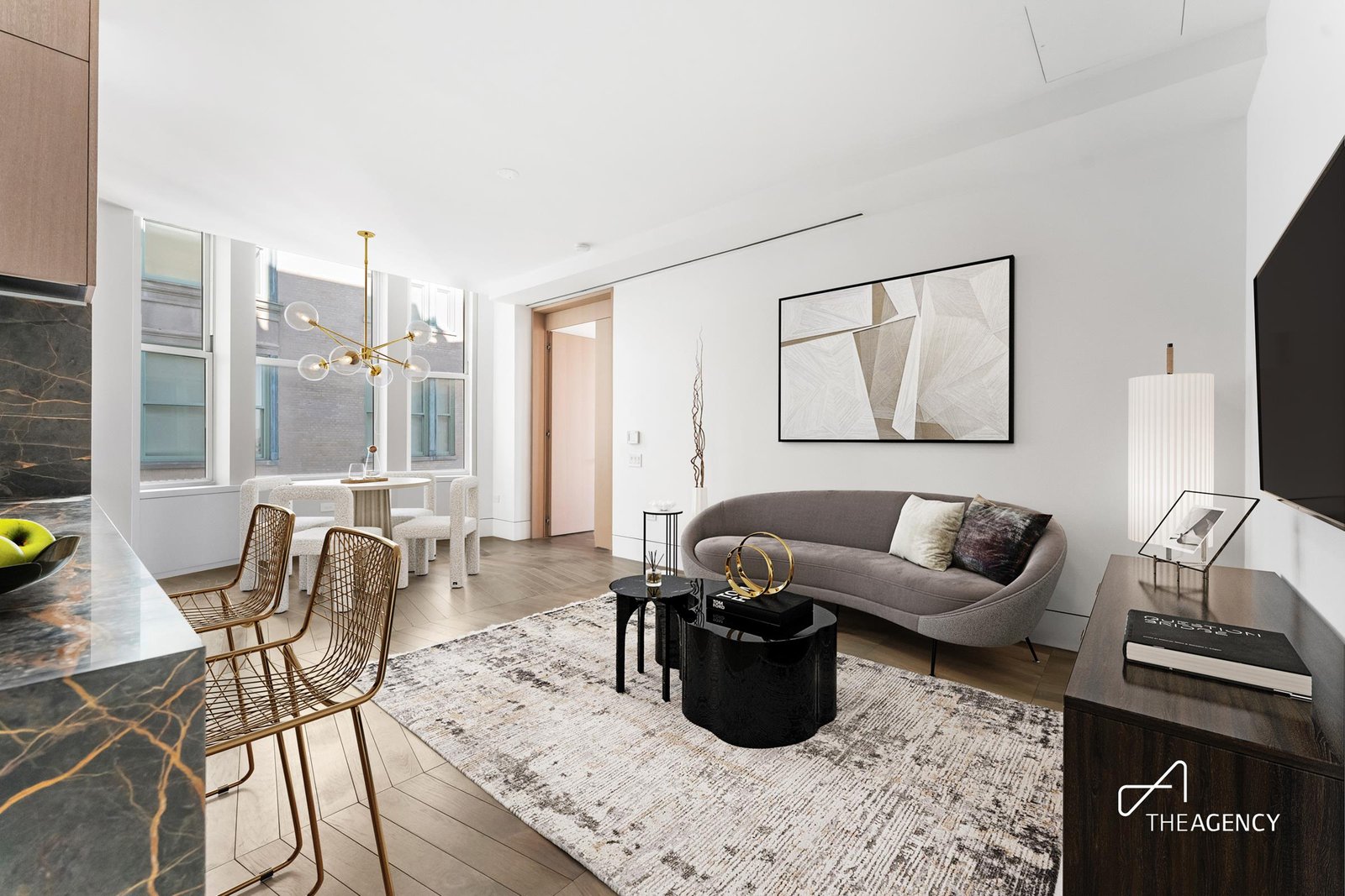Living room with a curved sofa at 49 Chambers Street 17-G
