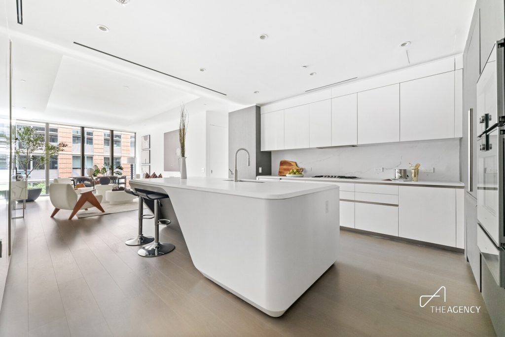 Kitchen with a large white island at 520 W 28th Street 7