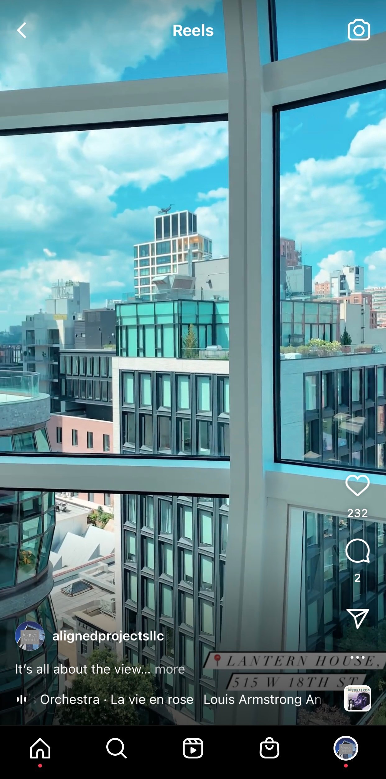 Instagram reel of a city view through floor-to-ceiling windows, captioned “It’s all about the view”